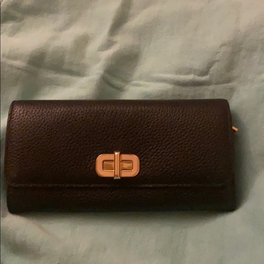 Michael Kors black leather wallet .
